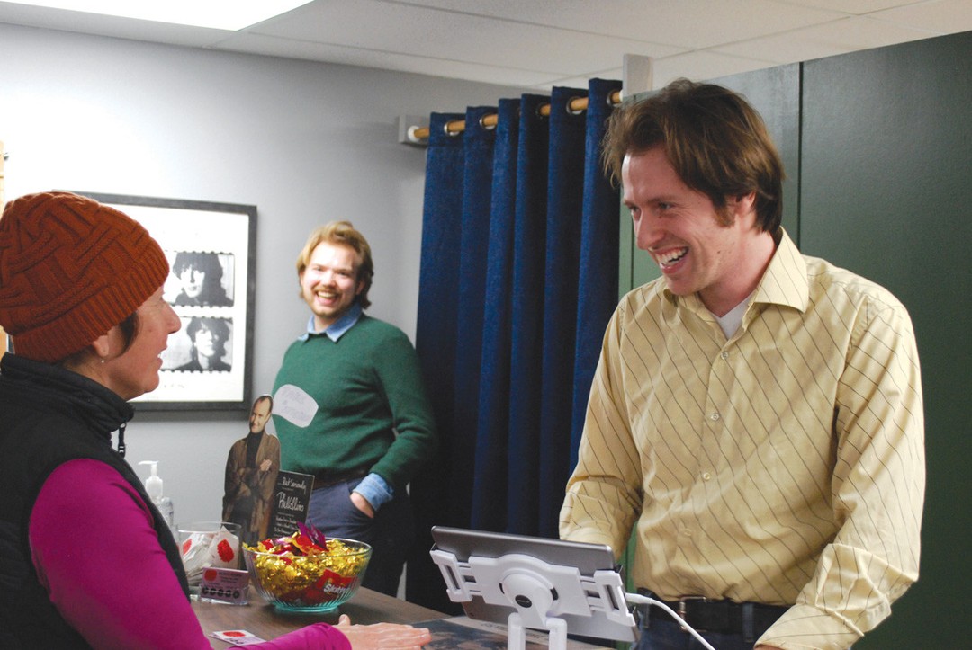 Owner Isaac Smith chatting with a customer